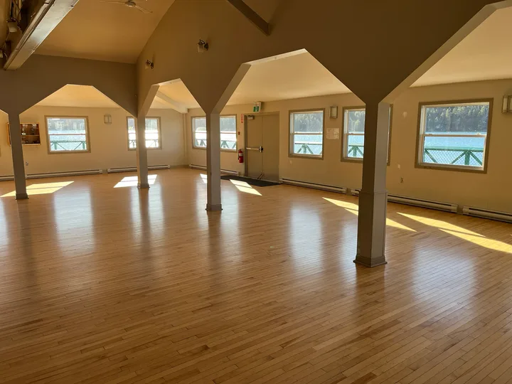 Reception hall image - empty hall - looking towards windows that overlook the water